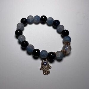 Elegant Blue and Black Beaded Bracelet with Hamsa Charm
